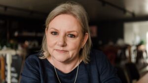 Portrait of Mell Millgate, Founder of Starfish Marketing, reflecting on ten years in business and lessons learned in marketing and leadership.